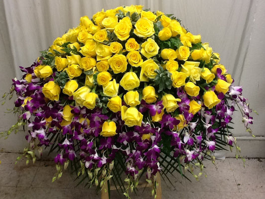 Yellow Roses and purple orchids casket cover