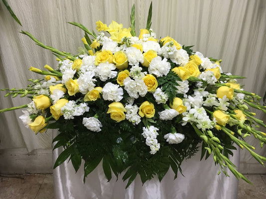 casket cover yellow roses white carnations