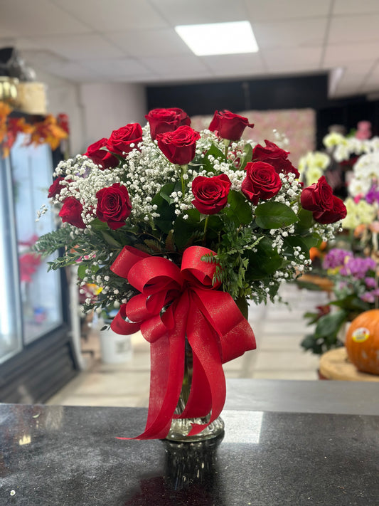 24 red roses in a vase